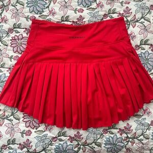 GOLDHINGE RED PLEATED TENNIS SKIRT